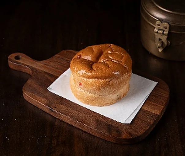 Bun maska on a wooden board
